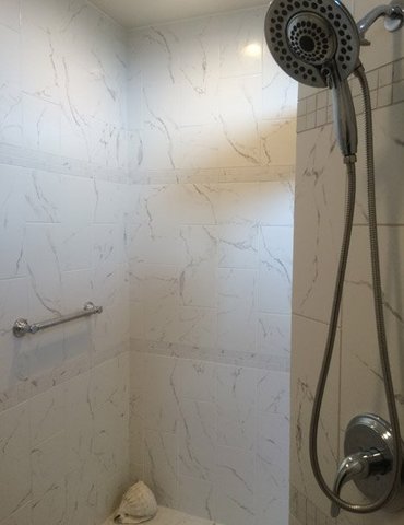 tile installation in bathroom - Contract Interiors, IN