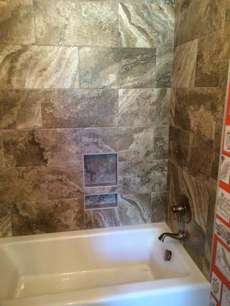 tile installation in bathroom - Contract Interiors, IN