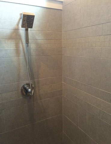 tile installation in bathroom - Contract Interiors, IN