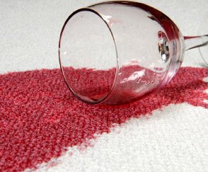 red wine spilled on white carpet - Contract Interiors, IN