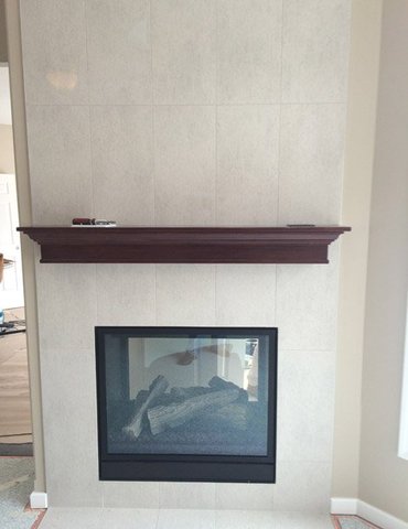 fireplace mantle tile installation - Contract Interiors, IN