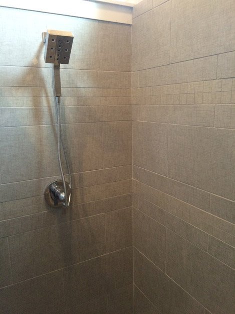 tile installation in bathroom - Contract Interiors, IN